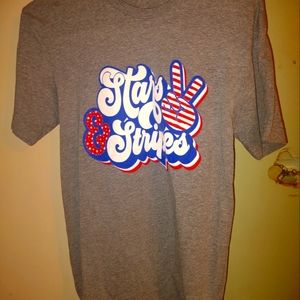 Woman's‎ Stars and Strips t shirt the brand is live and tell Lat